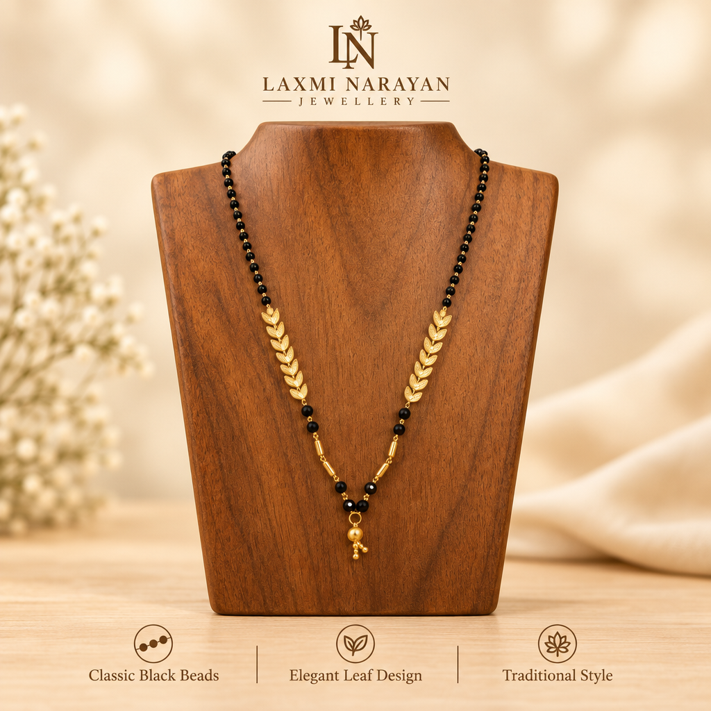 Black bead leaf design mangalsutra on wooden display