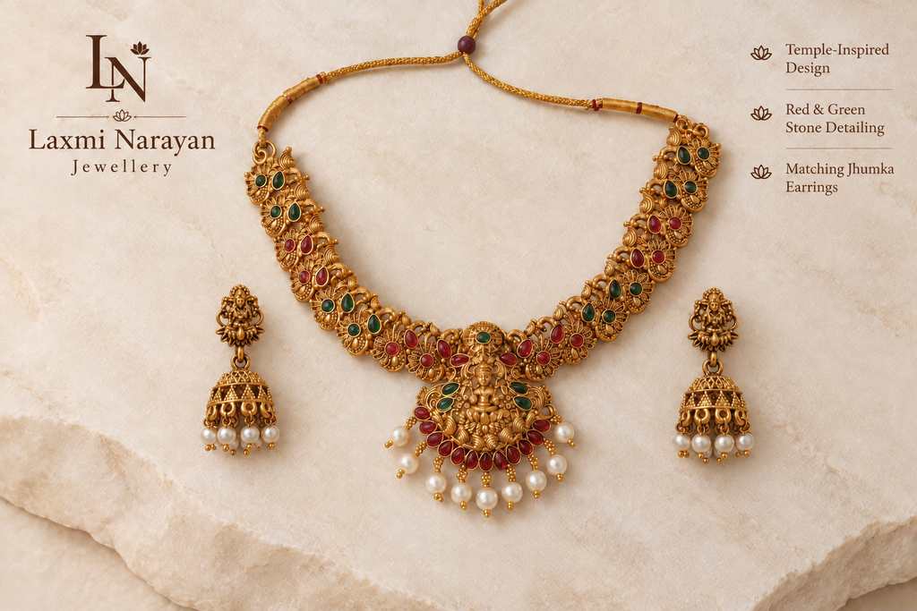 Necklace and jhumka set on stone with branding