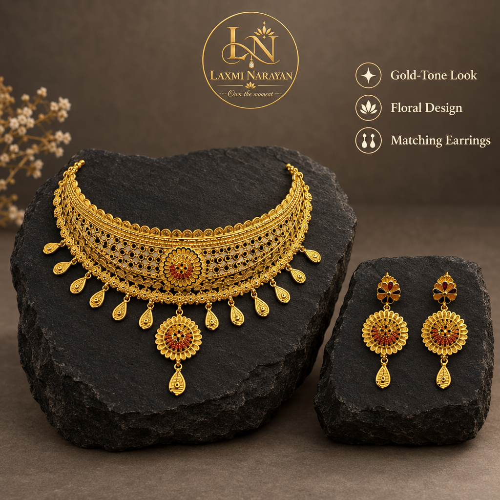 Floral necklace and matching earrings on black stone
